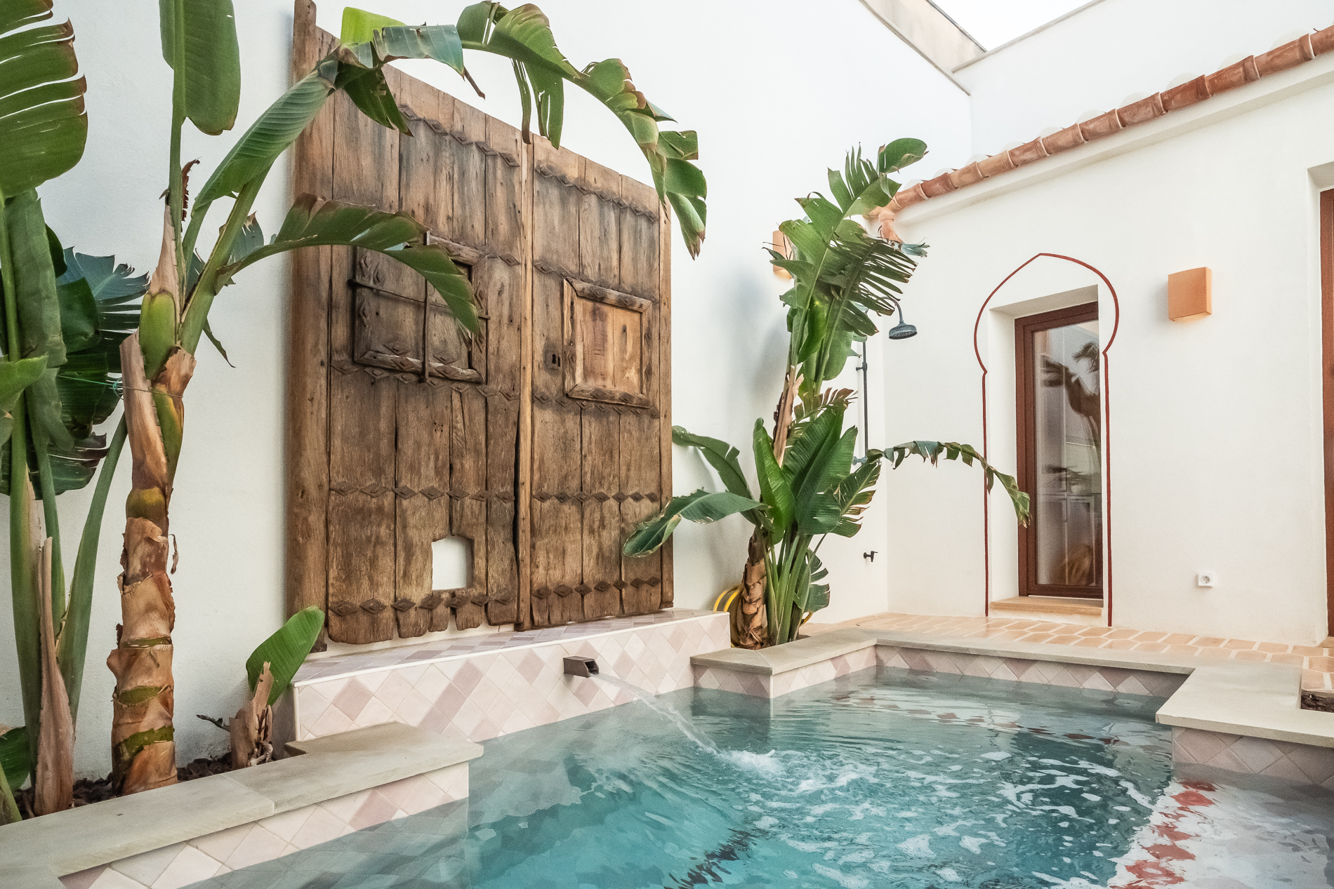 Light-filled two-bedroom loft style home for sale with sea-view roof terrace in gènova Architect-designed coastal townhouse for sale in palma with heated pool and roof terrace