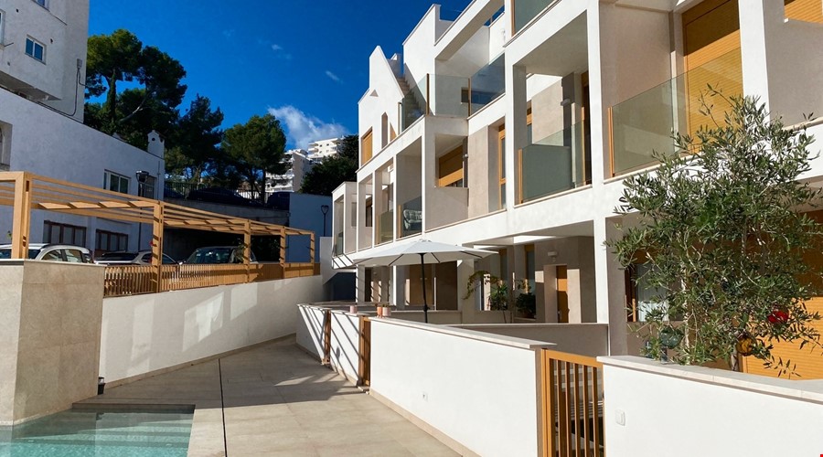 Contemporary duplex apartment for sale in Palma with private terraces and a communal pool