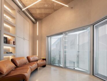 Design-led sea-view townhouse for sale with lift, garage and rooftop terrace in alcudia