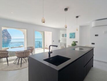 Sea view duplex penthouse for sale in port d'andratx with private rooftop and direct sea access