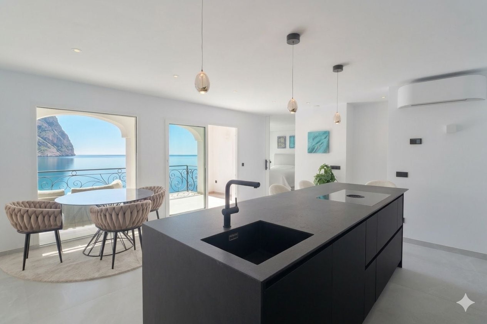 Sea view duplex penthouse for sale in port d'andratx with private rooftop and direct sea access