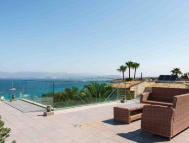 Elevated sea view townhouse with rooftop solarium & pool for sale in cala blava