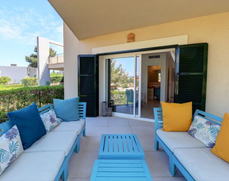 Contemporary ground floor garden apartment for sale in cala vinyes
