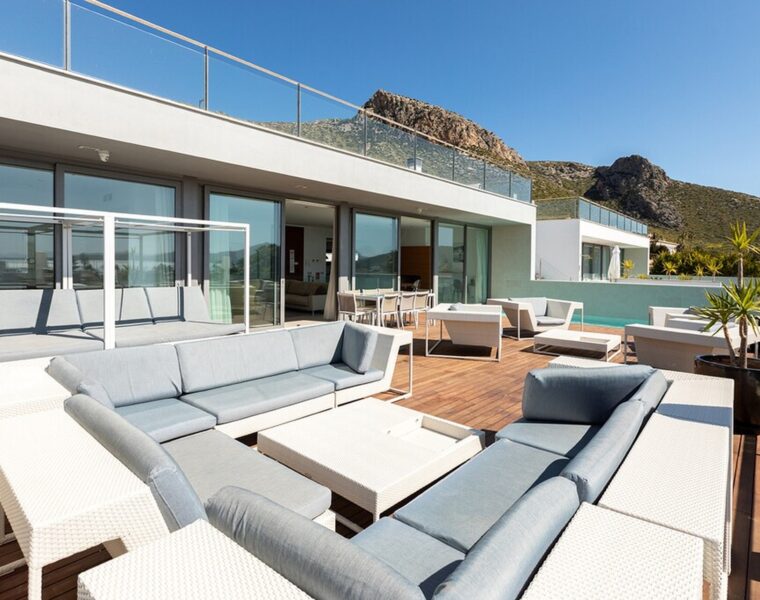 Modern coastal villa with panoramic bay views for sale in puerto pollensa