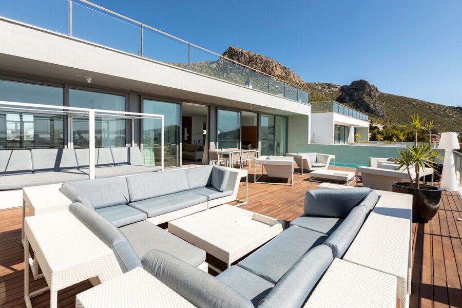 Modern coastal villa with panoramic bay views for sale in puerto pollensa