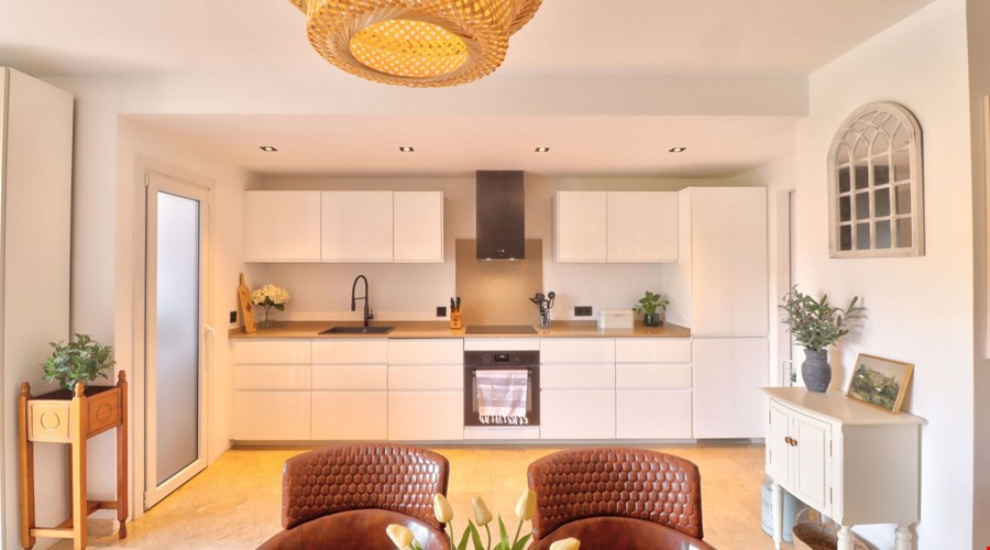 Renovated duplex apartment with marina views for sale in port adriano