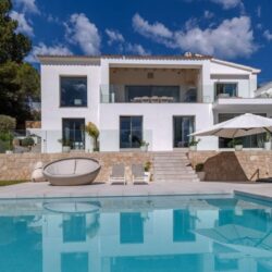 Refurbished five-bedroom villa with a rare flat garden for sale in camp de mar