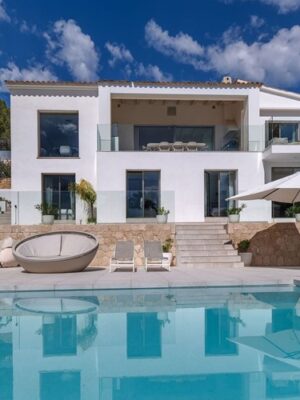 Refurbished five-bedroom villa with a rare flat garden for sale in camp de mar