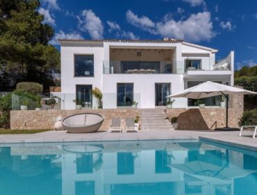 Refurbished five-bedroom villa with a rare flat garden for sale in camp de mar