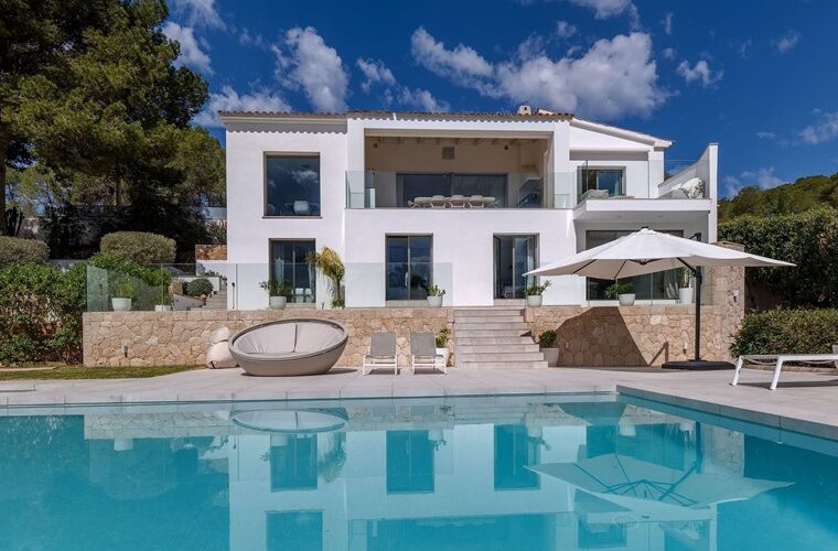 Refurbished five-bedroom villa with a rare flat garden for sale in camp de mar