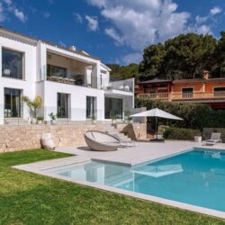 Refurbished five-bedroom villa with a rare flat garden for sale in camp de mar