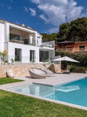 Refurbished five-bedroom villa with a rare flat garden for sale in camp de mar