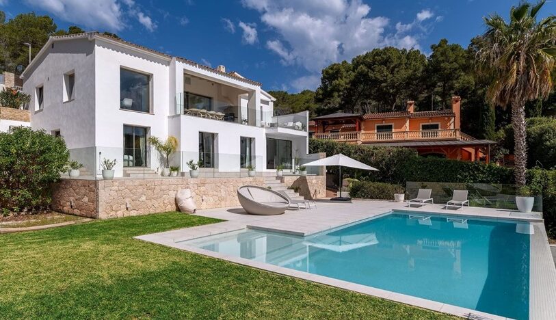 Refurbished five-bedroom villa with a rare flat garden for sale in camp de mar