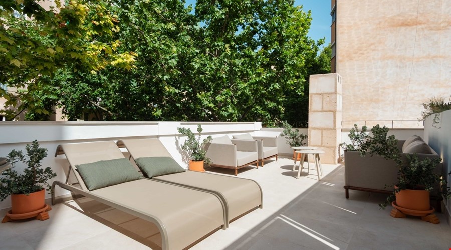 Restored duplex penthouse with private roof terrace for sale in Palma