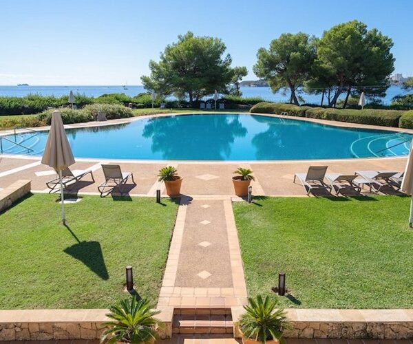 Refined coastal apartment with expansive terrace and sea views in portals nous