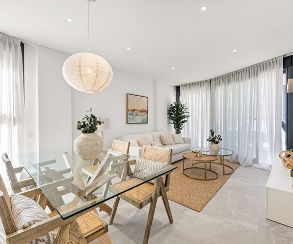 Modern two-bedroom garden apartment with communal pool in portals nous