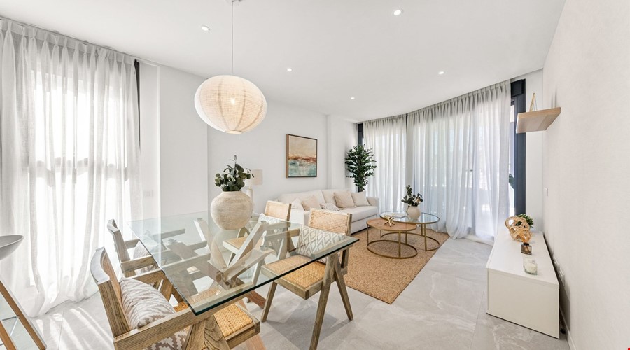 Modern two-bedroom garden apartment with communal pool in Palmanova