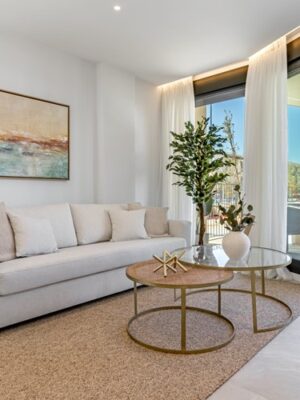 Modern two-bedroom garden apartment with communal pool in palmanova