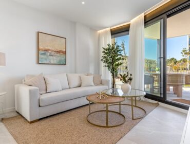 Modern two-bedroom garden apartment with communal pool in palmanova