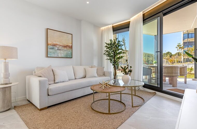 Modern two-bedroom garden apartment with communal pool in palmanova