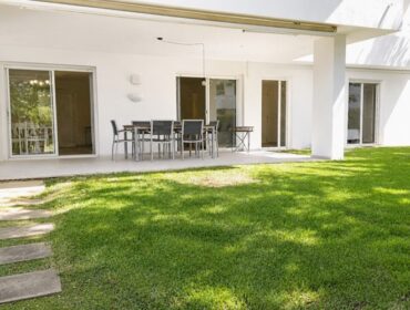Spacious ground floor apartment with private garden and pool access for sale in pollensa