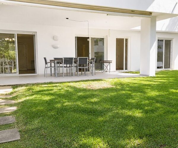 Spacious ground floor apartment with private garden and pool access for sale in pollensa