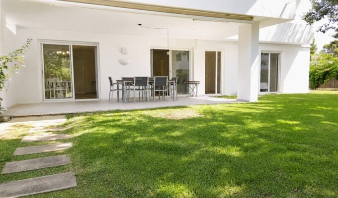 Spacious ground floor apartment with private garden and pool access for sale in pollensa