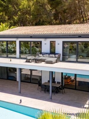 Contemporary coastal sanctuary with infinity pool and gym in port d’andratx