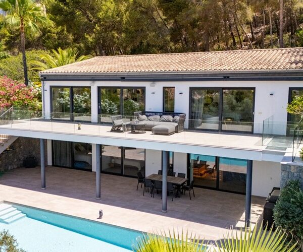 Contemporary coastal sanctuary with infinity pool and gym in port d’andratx