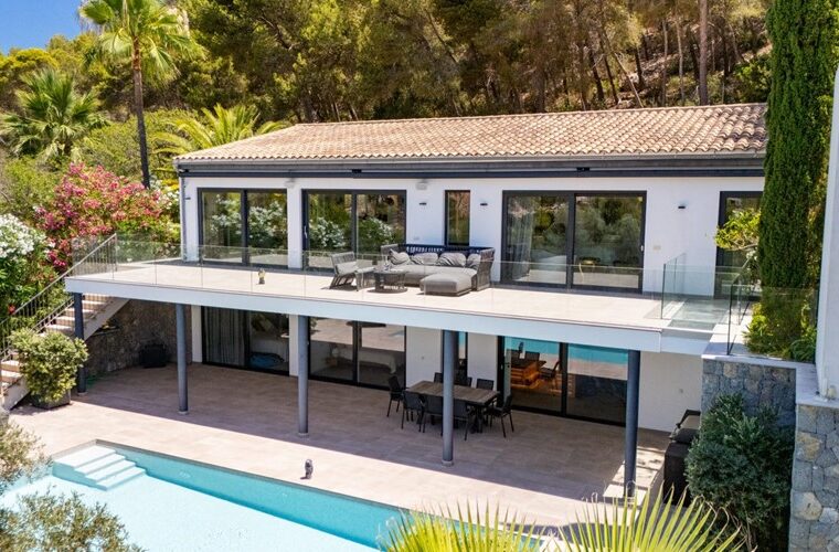 Contemporary coastal sanctuary with infinity pool and gym in port d’andratx