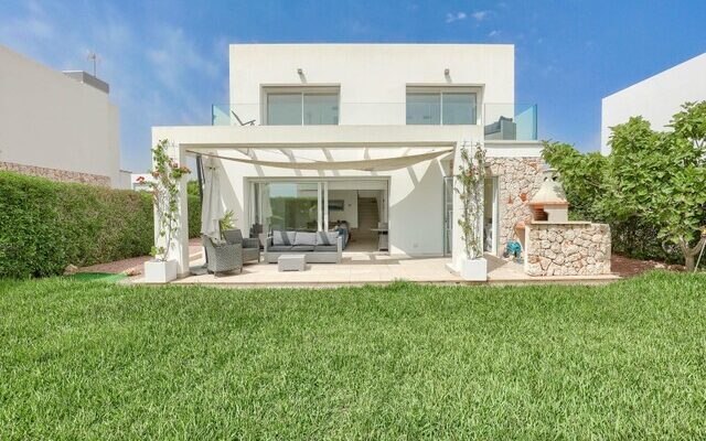 Modern three-bedroom coastal villa with sun-drenched terraces for sale near llucmajor