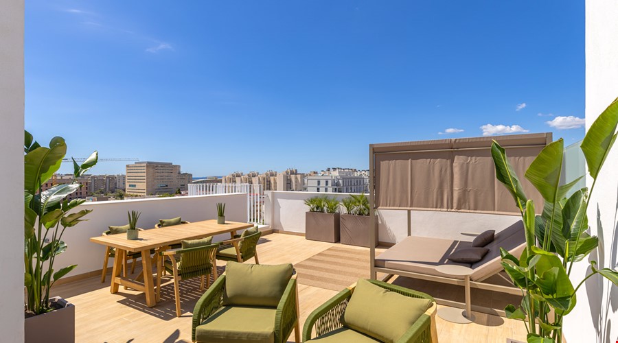 Modern coastal apartment with private roof terrace and sea views for sale in Portixol, Palma