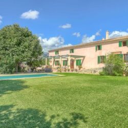 Grand village residence with expansive grounds and flexible living spaces in campanet