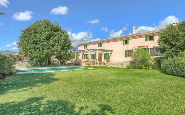 Grand village residence with expansive grounds and flexible living spaces in campanet