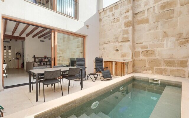Restored historic townhouse with private pool for sale in pollensa
