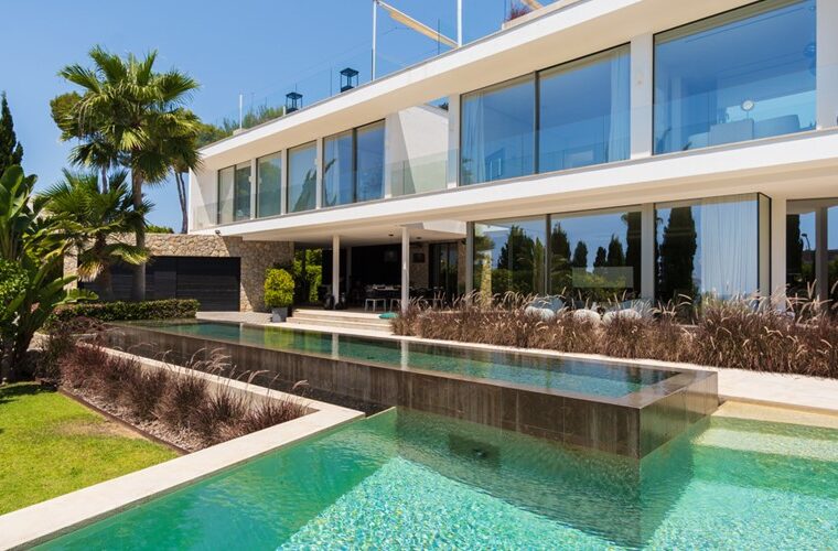 Contemporary five-bedroom villa with rooftop terrace and coastal vistas in sol de mallorca