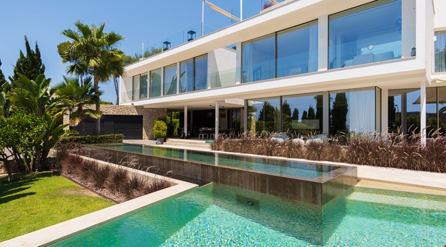 Contemporary five-bedroom villa with rooftop terrace and coastal vistas in sol de mallorca
