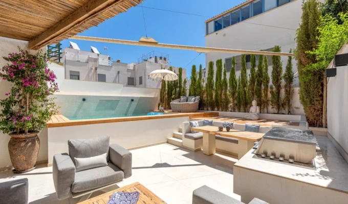 Exquisitely renovated townhouse with pool and roof terrace for sale in palma