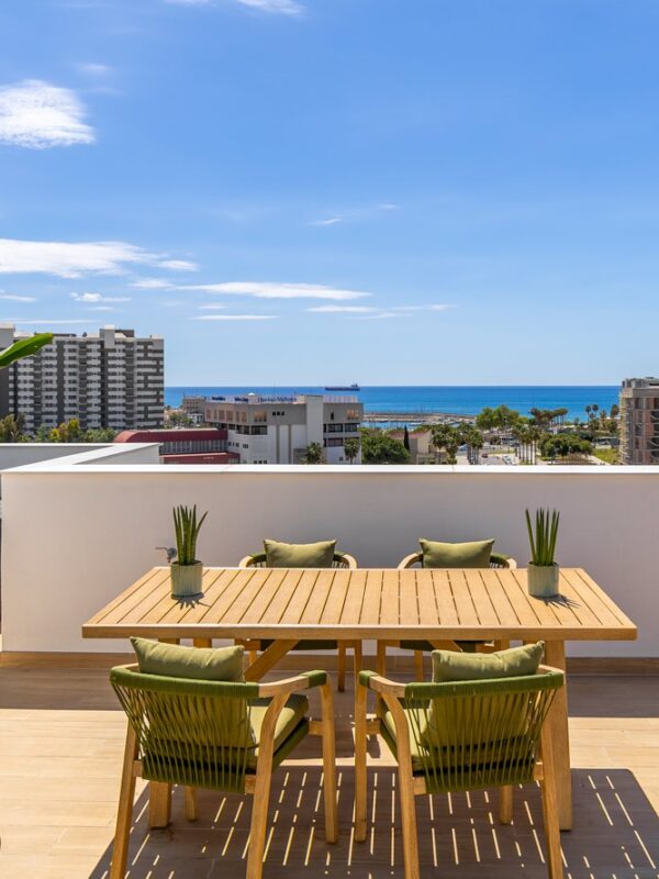 Modern coastal apartment with private roof terrace and sea views for sale in portixol, palma