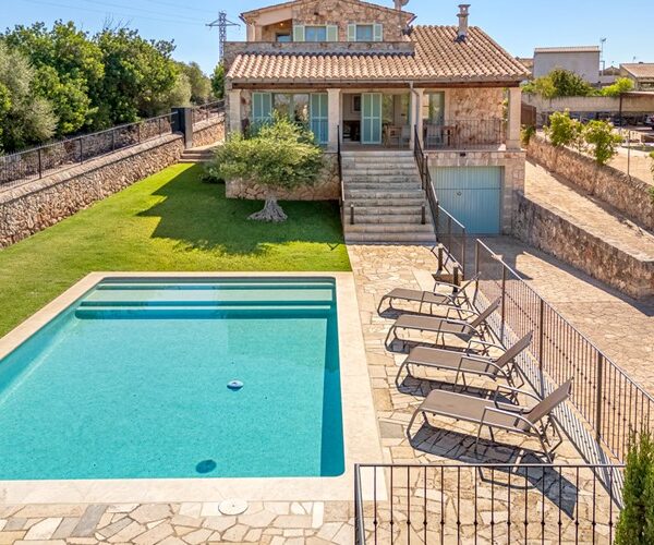Serene three-bedroom villa with private pool and expansive views in sineu